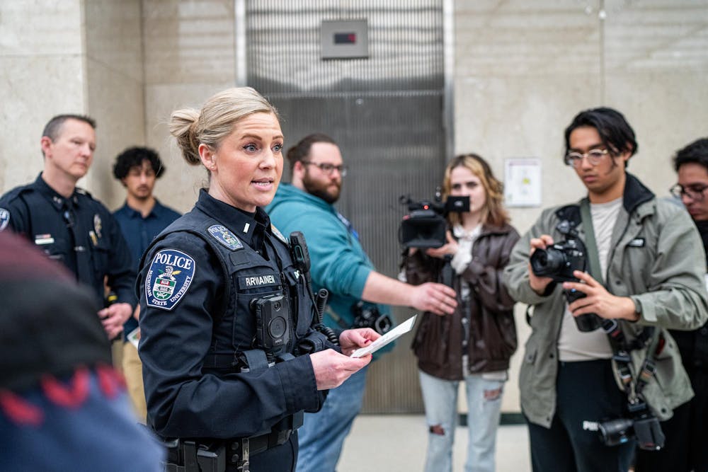 <p>Michigan State University Police Lieutenant Kimberly Parviainen gives the first warning to the Hurriya Coalition and MSU Sunrise at the Hannah Administration Building in East Lansing, Michigan on April 11, 2025. Members of MSU Sunrise and the Hurriya Coalition protested in the lobby, 19 protestors were arrested after multiple warnings from the police.</p>