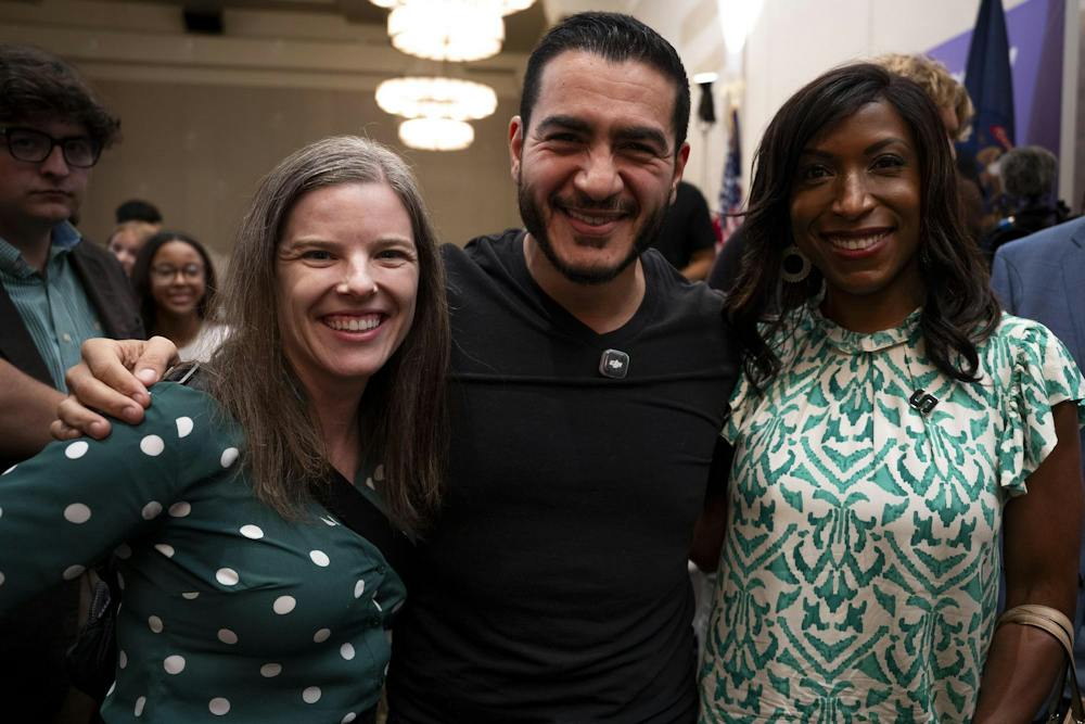 <p>Michigan U.S. Senate candidate Abdul El-Sayed poses for a photo with Michigan State University Trustees Kelly Tebay (left) and Brianna Scott (right) after a rally at the MSU Union in East Lansing, Mich., on Sept. 11, 2026.</p>