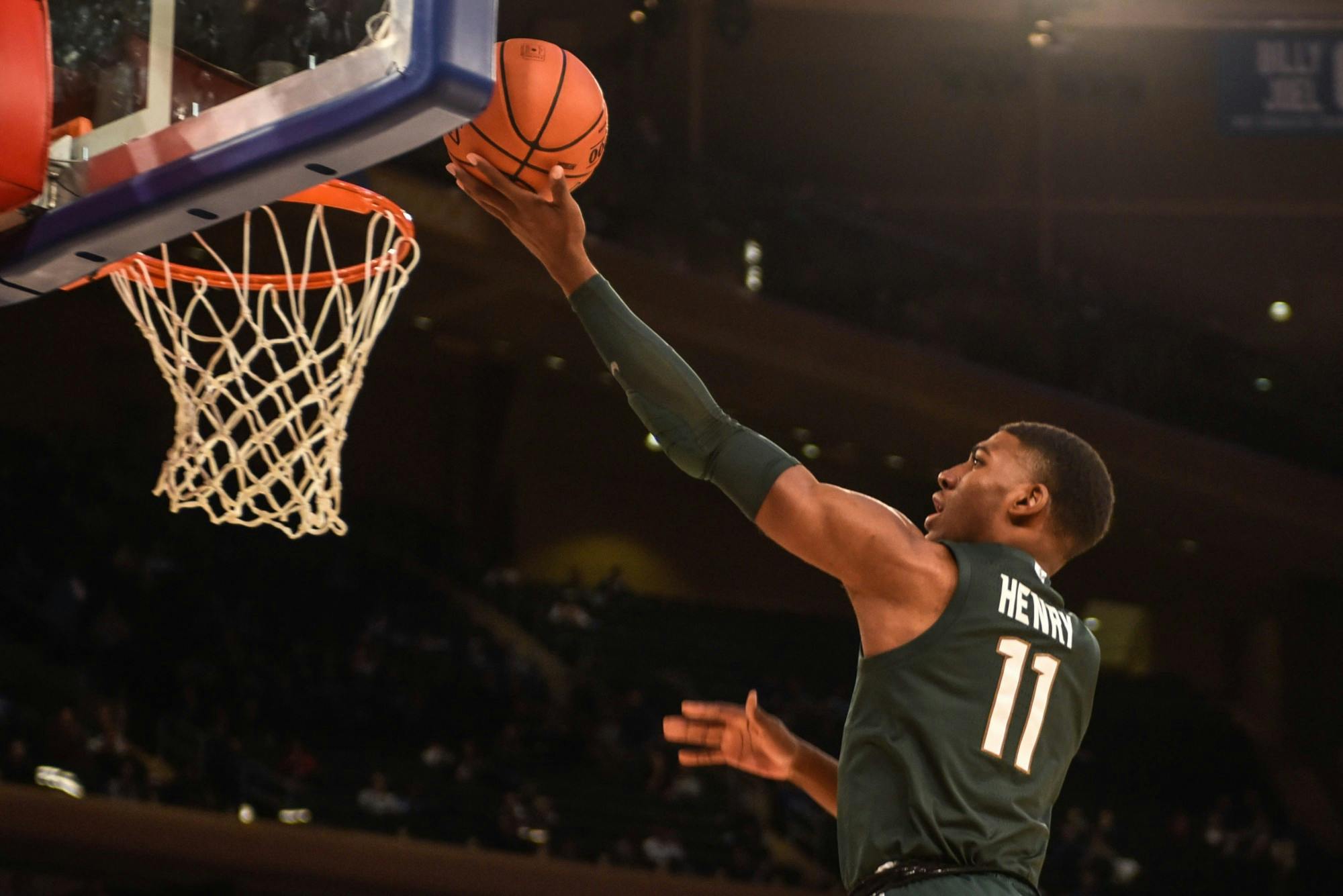 Sophomore forward Aaron Henry (11) shoots the ball during the game against Kentucky at the State Farm Champions Classic at Madison Square Garden on Nov. 5, 2019. The Spartans fell to the Wildcats, 69-62.