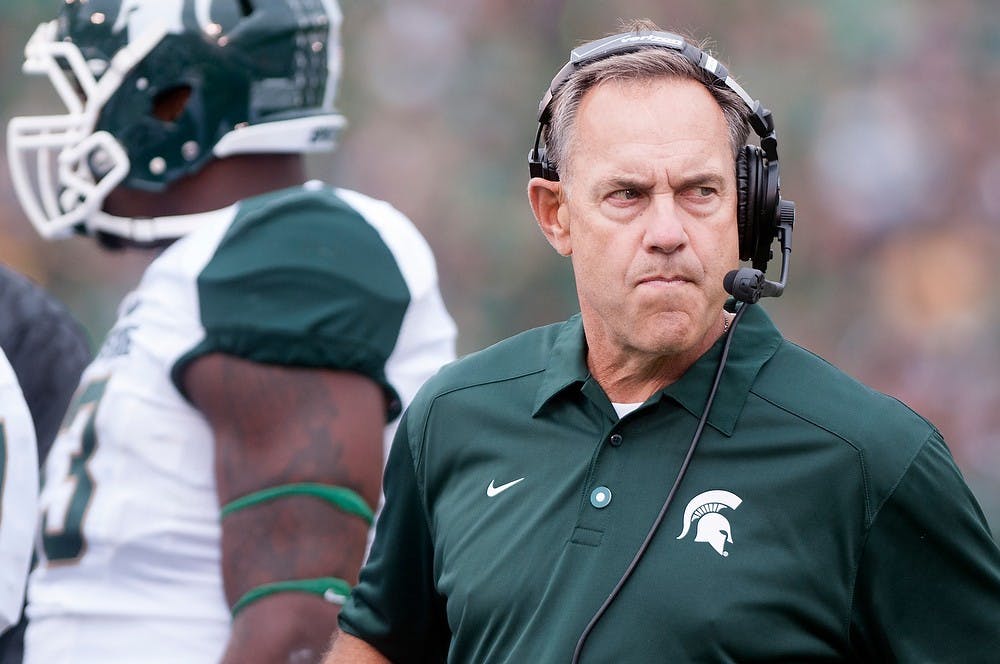 	<p>Head coach Mark Dantonio reacts to the game against Notre Dame on Sept. 21, 2013, at Notre Dame Stadium in South Bend, Ind. The Fighting Irish defeated the Spartans 17-13. Julia Nagy/The State News</p>