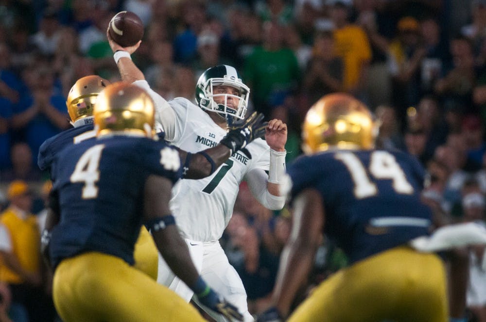 Senior quarterback Tyler O'Connor (7) throws the football during the game against Notre Dame on Sept. 17, 2016 at Notre Dame Stadium in South Bend, Ind. The Spartans defeated the Fighting Irish, 36-28.