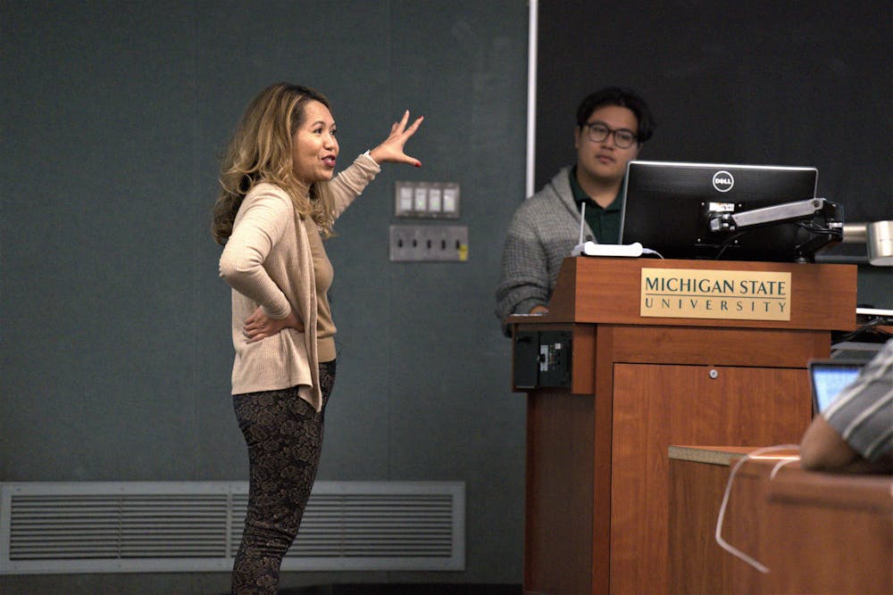 <p>Presenter Regina Gong, a Student Success Librarian, presents the topic of an Open Educational Resource during the ASMSU General Assembly on Dec. 8, 2022. The meeting was held at the International Center. </p>