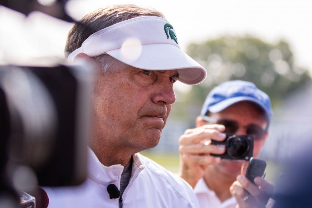 Head coach Mark Dantonio answers questions from the media on Aug. 14 at Duffy Daugherty Football Building.