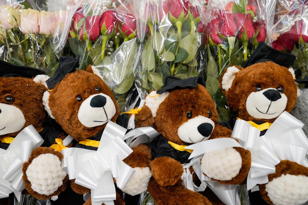 Arrangements of teddy bears and flowers are displayed for the MSU 2023 graduates at Breslin Center on May 5, 2023. 