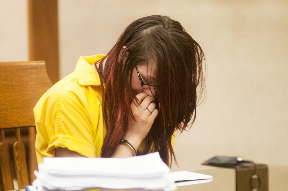 <p>Samantha Grigg gets emotional during her sentencing hearing May 27, 2014, at Clinton County Circuit Court, 100 Michigan 21, in St Johns, Mich. Grigg was sentenced to 6 to 15 years in prison after pleading guilty to manslaughter in the death of MSU student Dustyn Frolka. Hayden Fennoy/The State News</p>