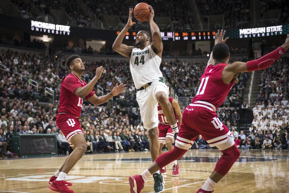 Junior forward Nick Ward (44) shoots the ball during the men's basketball game against Indiana on Feb. 2, 2019 at Breslin Center. Nic Antaya/The State News