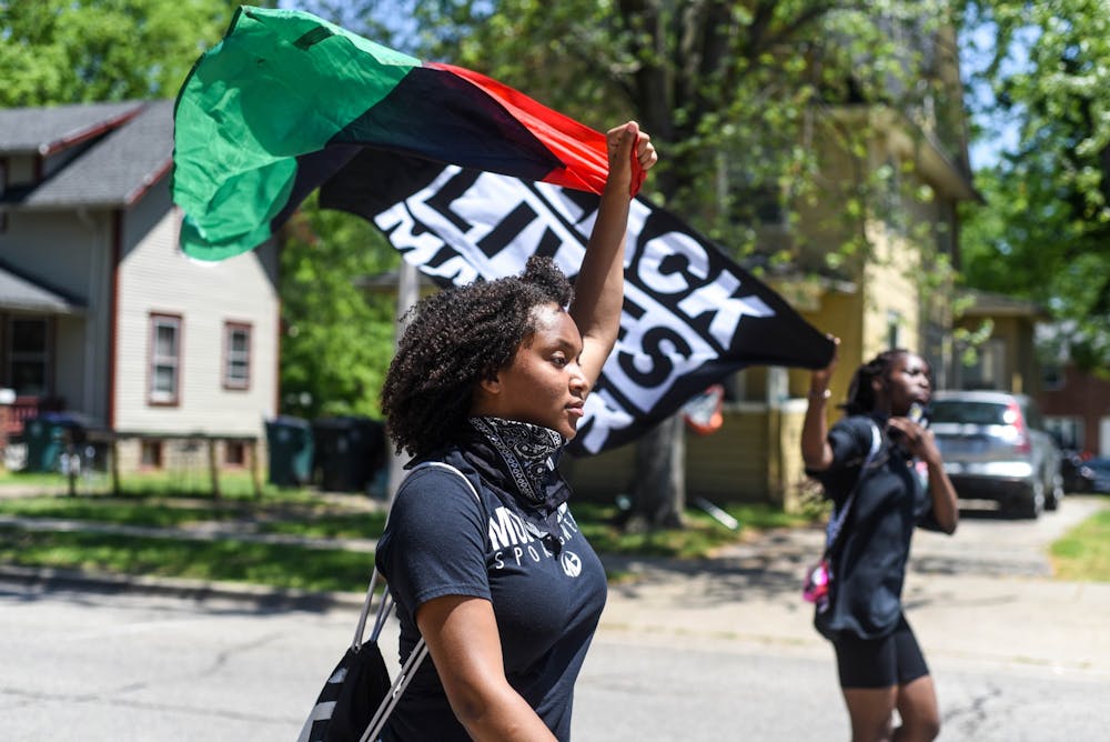 <p>Protesters march outside of the East Lansing Police Department at the “We’re Next” protest against police brutality in East Lansing on June 2, 2020. The protest was peaceful and speakers talked about the current state of the nation as well as removing East Lansing Police Officer Andrew Stephenson from his position.</p>