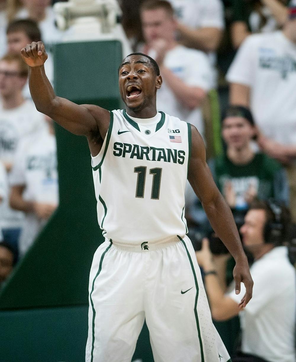 <p>Freshman guard Lourawls Nairn Jr.,11, calls out to a teammate during the game against The Masters College on Nov. 3, 2014, at the Breslin Center. The Spartans defeated the Mustangs 97-56. Raymond Williams/The State News</p>