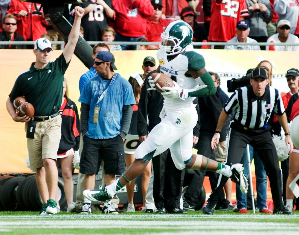 Sophomore running back Le'Veon Bell runs into the end zone for his first touchdown of the game during the third quarter on Jan. 2, 2012 during the Outback Bowl at  Raymond James Stadium in Tampa, Fla. State News File Photo