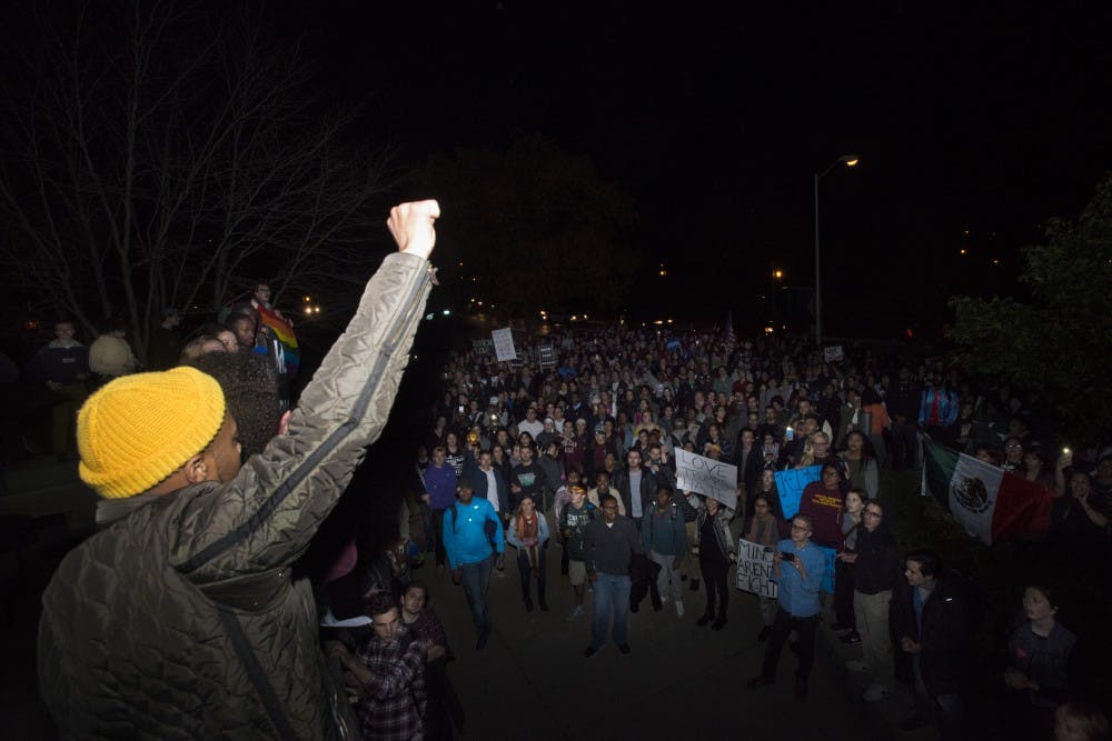 Psychology senior Molefi Brandon speaks during a protest on Nov. 10, 2016 at the Union. Brandon in on the eboard for the black male empowerment experience. 