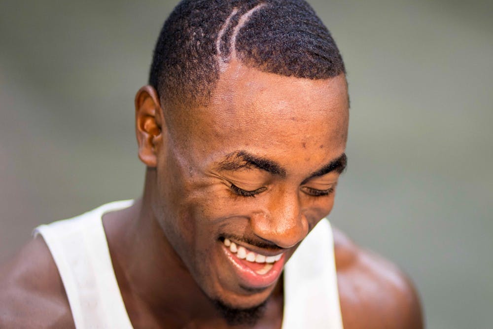 Senior guard Lourawls "Tum Tum" Nairn Jr. laughs while talking to reporters at media day on Oct 11, 2017, at Breslin Center.