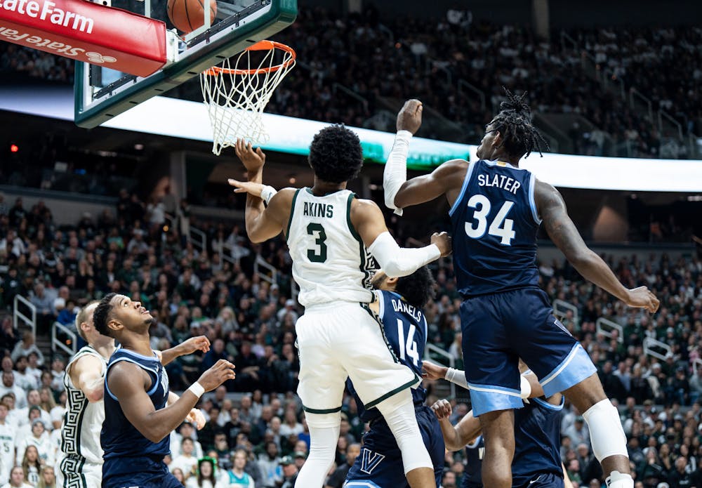 Sophomore guard Jaden Akins (3) shoots and scores during a game against Villanova at the Breslin Center on Nov. 18, 2022. The Spartans defeated the Wildcats 73-71. 