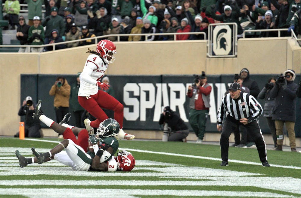 <p>Spartan wide receiver Jayden Reed﻿ catches the ball for a touchdown during the match against Rutgers on Nov. 12, 2022.</p>
