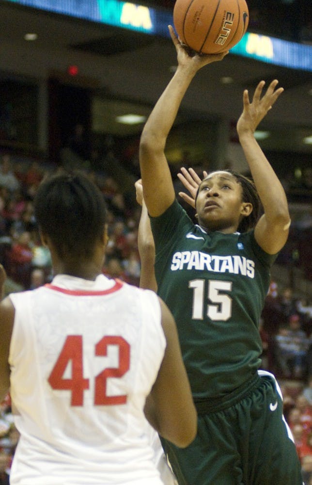 Senior forward Cetera Washington goes up for a shot in the second half Sunday at Value City Arena in Columbus, Ohio. Washington led the Spartans in points and rebounds, with 12 and nine respectively, against the Ohio State Buckeyes. 