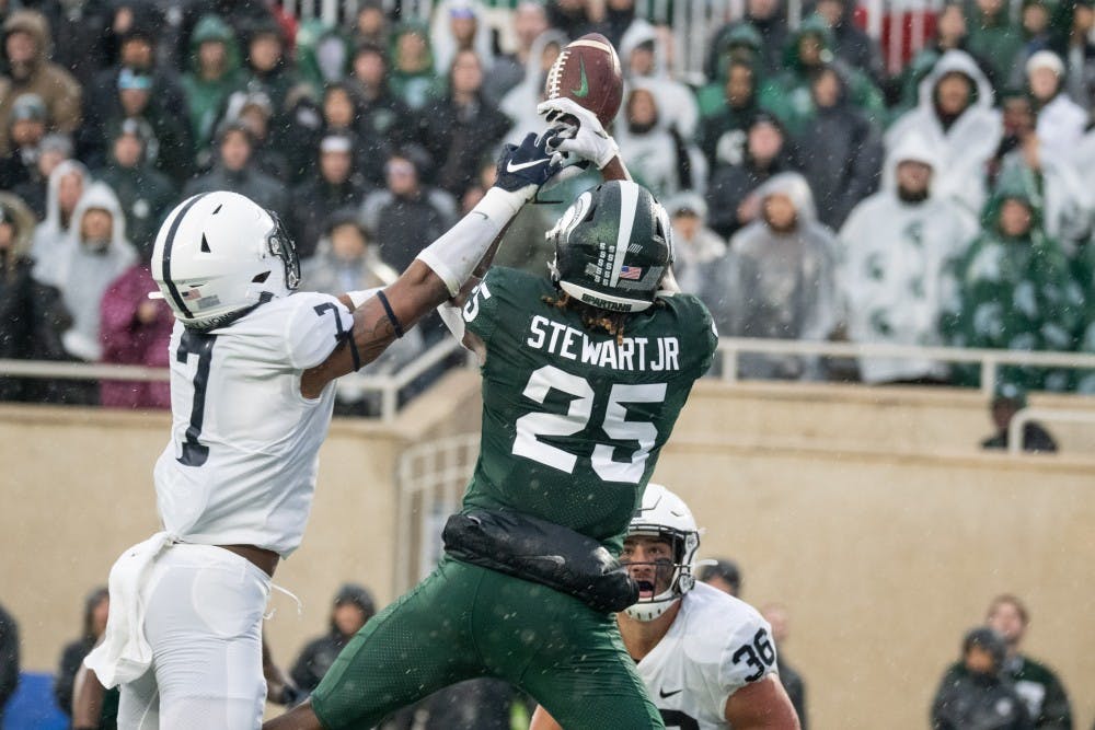 <p>Senior wide receiver Darrell Stewart Jr. (25) tries to bring in a pass in the end zone during the game against Penn State Oct. 26, 2019 at Spartan Stadium. The Spartans fell to the Nittany Lions, 28-7.</p>