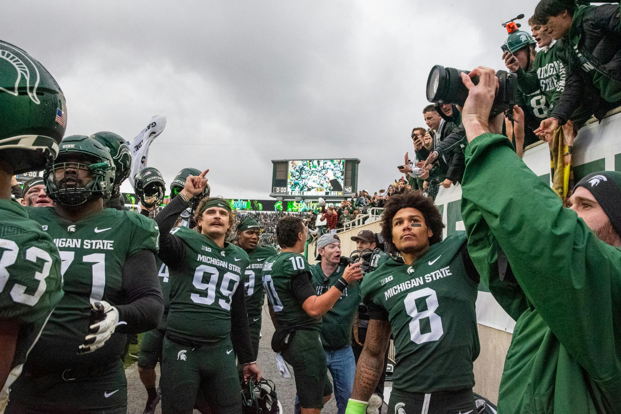 <p>Michigan State football sings the fight song after the Spartans raced back from a 16-point deficit to beat the Wolverines on Oct. 30, 2021.</p>