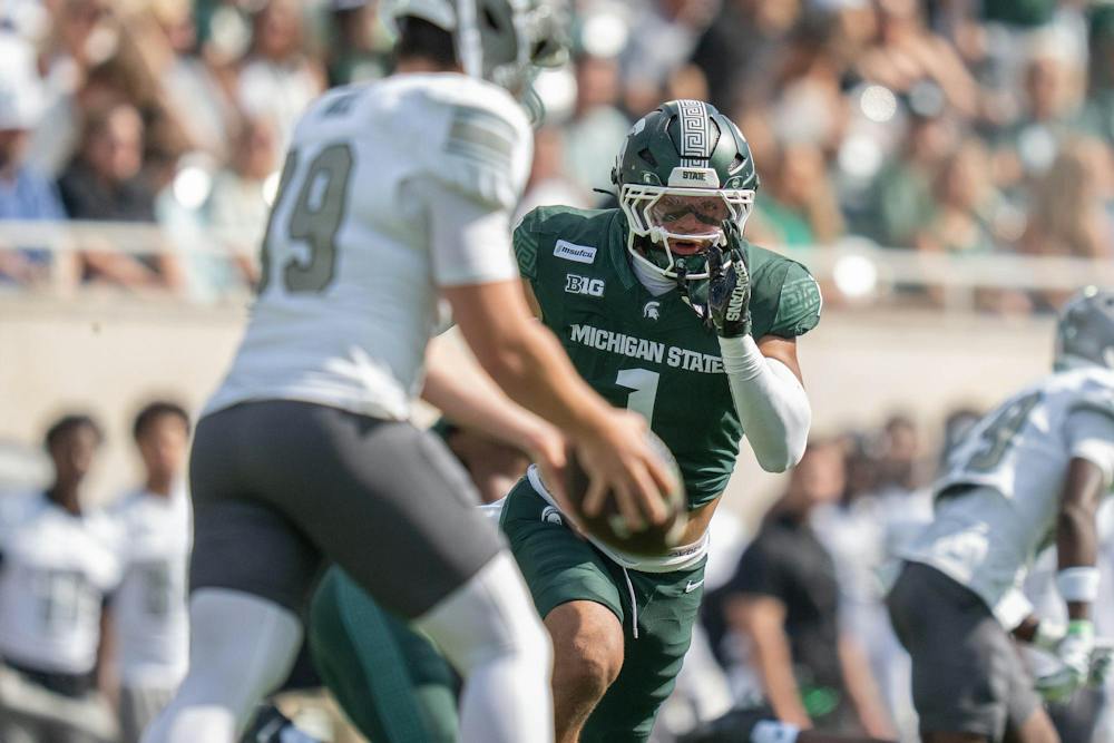 <p>Michigan State edge Kenny Soares Jr (1) rushes toward Eastern Michigan's punter Daniel Hull (39) in an attempt to block his kick after Eastern fails to make first down in Spartan Stadium in East Lansing, Mich., on Sept. 12, 2026.</p>