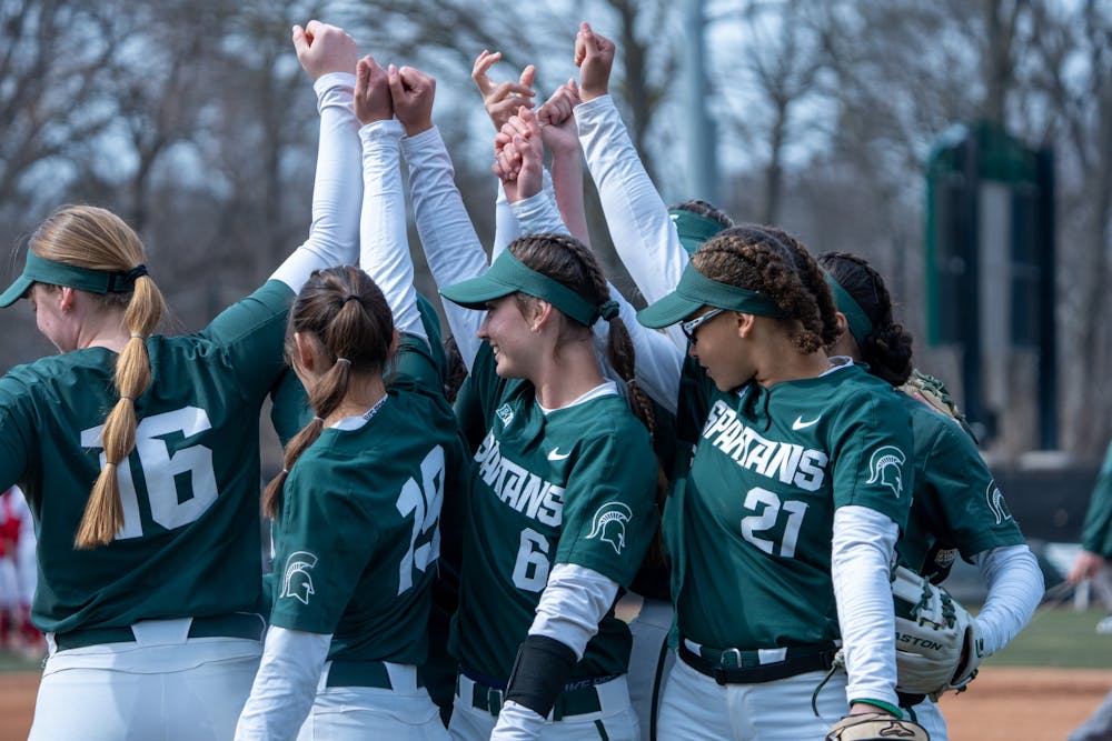 <p>Michigan State University's woman softball teams come together as they prepare to host Wisconsin Woman's softball team during a game series on March 24, 2023, at Secchia Softball Stadium.&nbsp;</p>