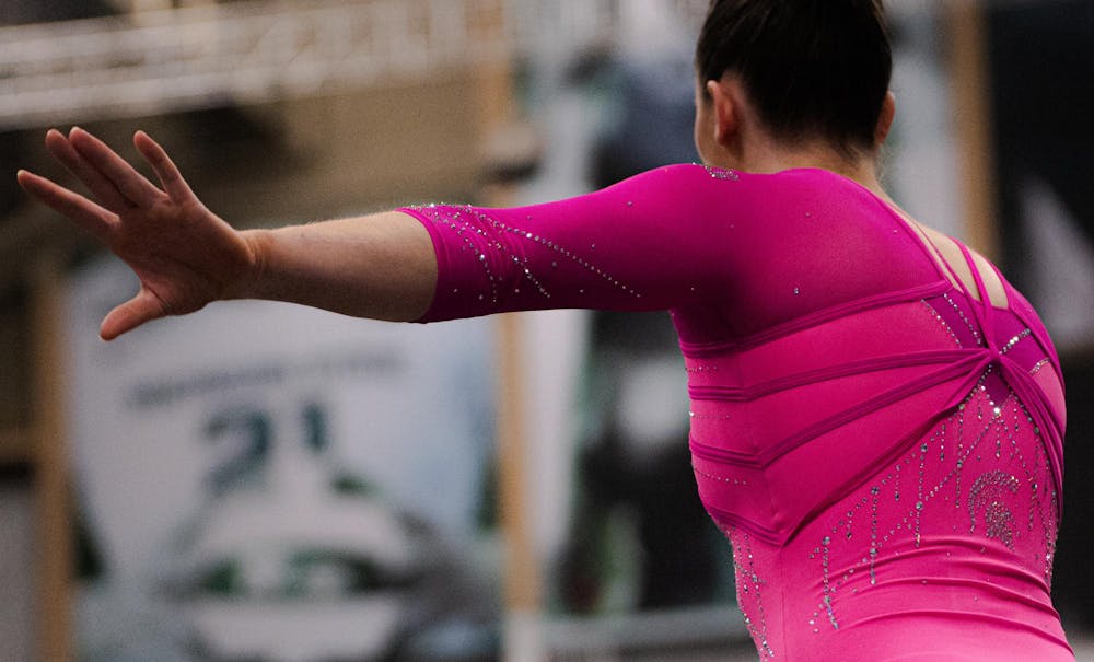 MSU sophomore AA Amy Doyle poses on the floor at the Jenison Field House in East Lansing, MI, on Feb. 21, 2026.
