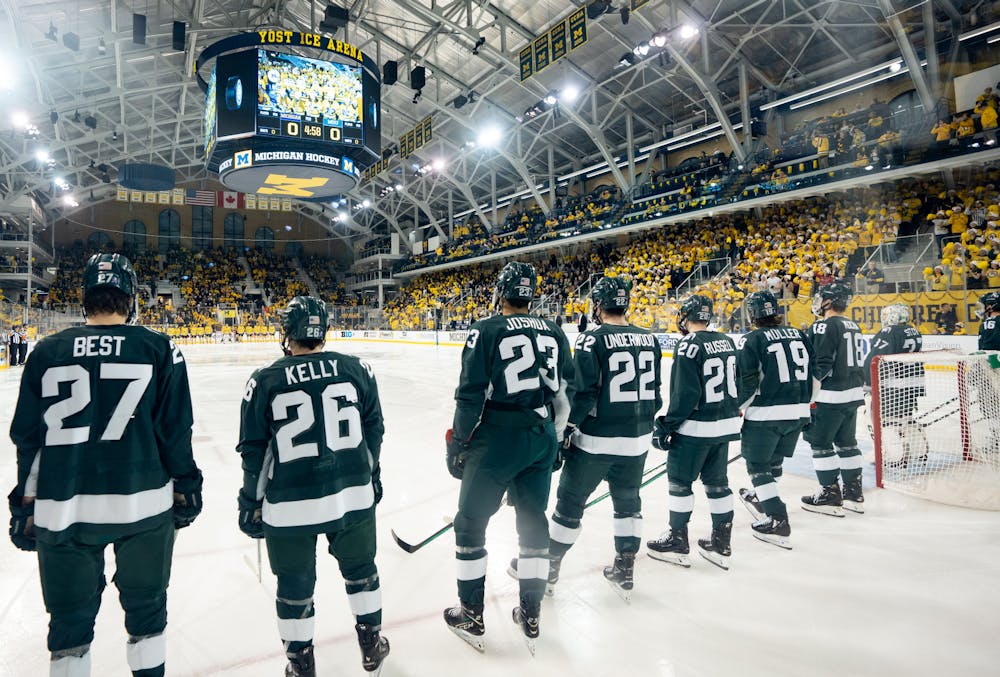 Spartans line up for a game against University of Michigan at Yost Ice Arena on Dec. 10, 2022. The Spartans lost to the Wolverines with a score of 2-1. 
