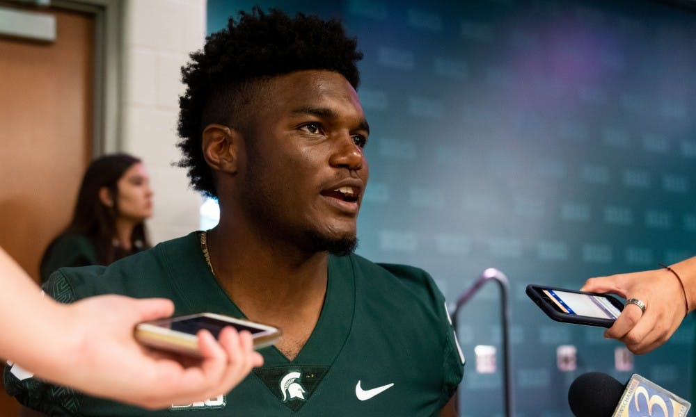 <p>Junior linebacker Brandon Bouyer-Randle speaks to the press during Michigan State’s Football Media Day at Spartan Stadium on Aug. 5, 2019. </p>