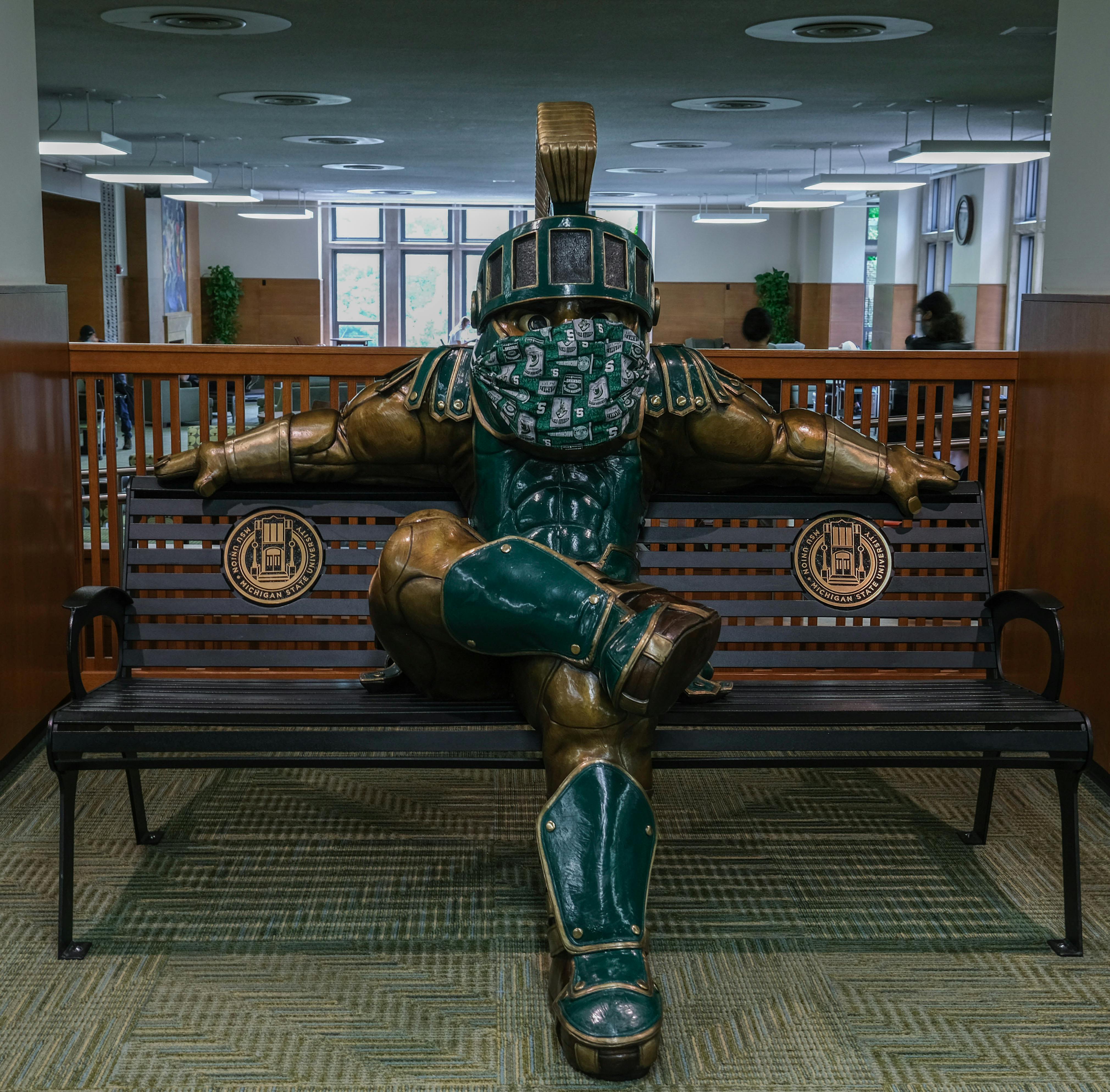 <p>Sparty statue with a mask in the MSU Union on Sept. 15, 2020.</p>