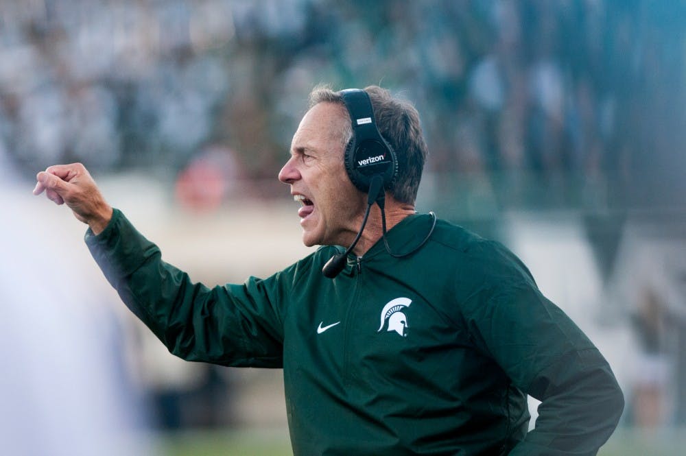 Head coach Mark Dantonio calls out a play during the game against Brigham Young University on Oct. 8, 2016 at Spartan Stadium. The Spartans were defeated by the Cougars, 31-14.