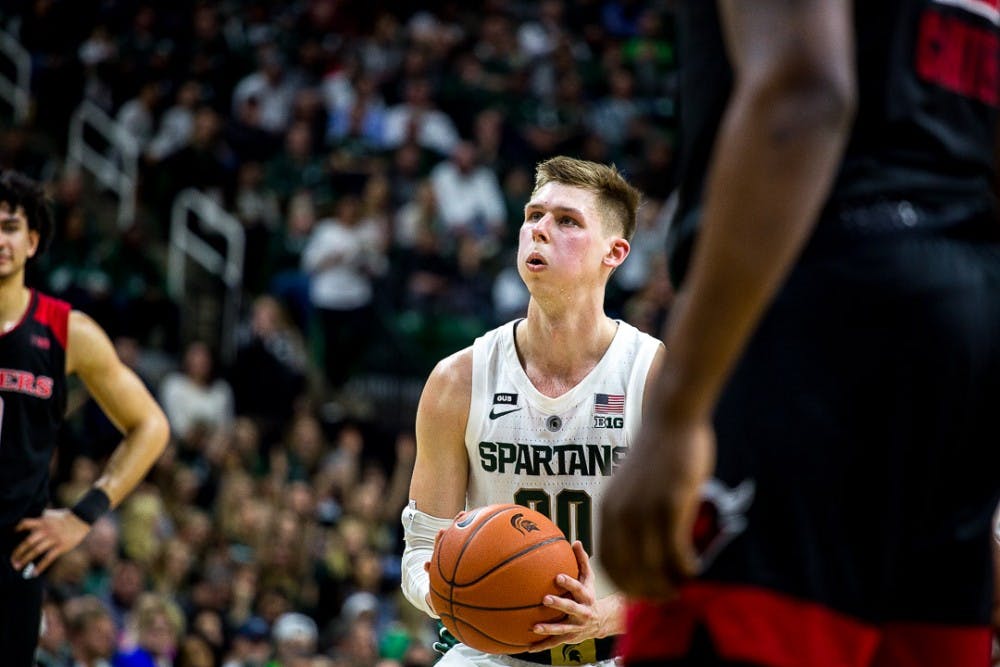Senior guard Matt McQuaid takes a breath before a free throw during the game against Rutgers on Feb. 20, 2019 a the Breslin Center. The Scarlet Knights led the Spartans, 32-25 at halftime.