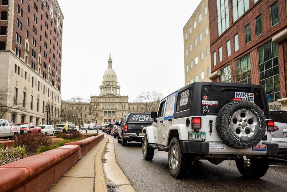 Scenes from the Operation Gridlock protest on April 15, 2020 around the Michigan State Capitol Building.