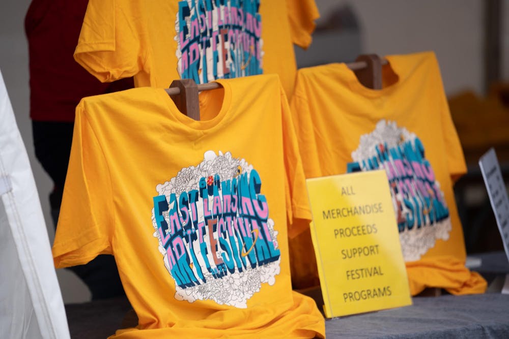 Merch at the East Lansing art festival held across downtown East Lansing on May 20, 2023.