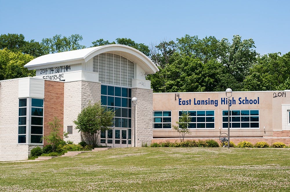 <p>Graffiti is seen on June 6, 2014, at East Lansing High School. Corey Damocles/The State News</p>