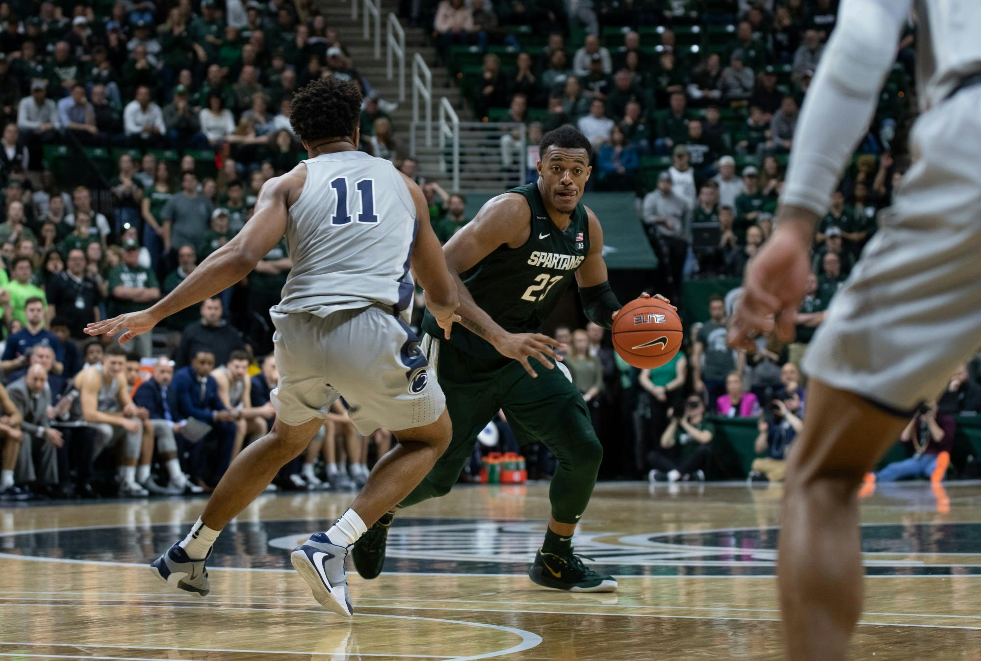 <p>MSU forward Xavier Tillman (23) dribbles during a basketball game against Penn State at the Breslin Center on Feb. 4, 2020. The Spartans fell to the Nittany Lions, 70-75.</p>