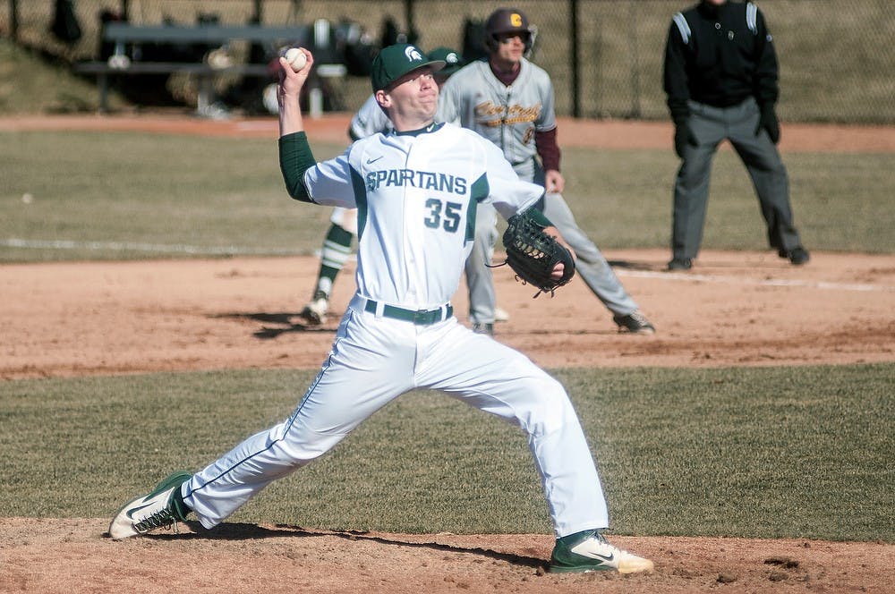 <p>Sophomore pitcher Walter Borkovich throws a pitch during the game against Central March 24, 2015, at McLane Stadium at Kobs Field. It was the Spartans first home game of the season and they defeated the Chippewas, 8-3. Allyson Telgenhof/The State News.</p>