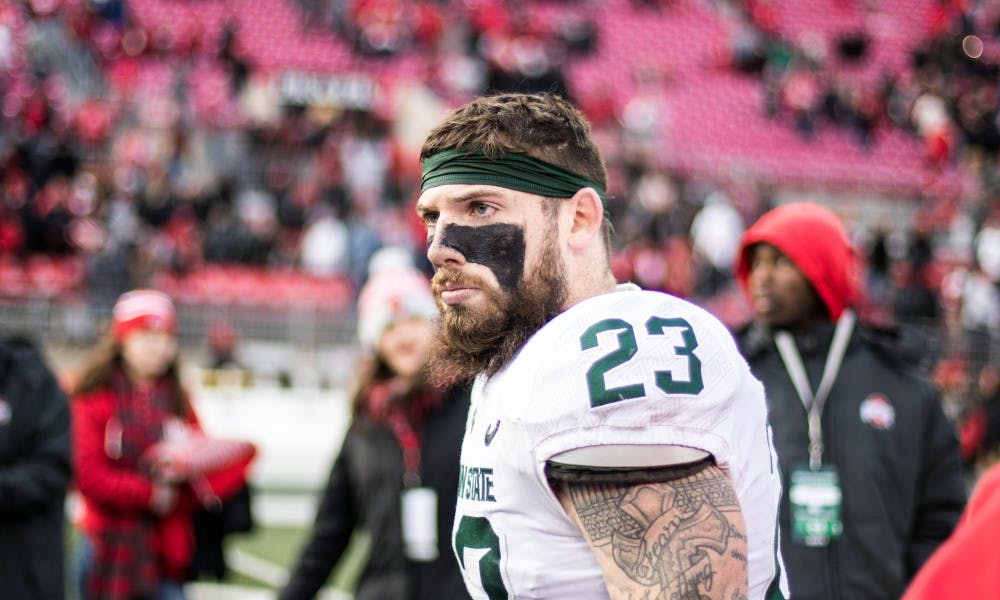 Senior linebacker Chris Frey (23) is pictured after the Ohio State game, on Nov. 11, at Ohio Stadium. The Spartans fell to the Buckeyes, 48-3.