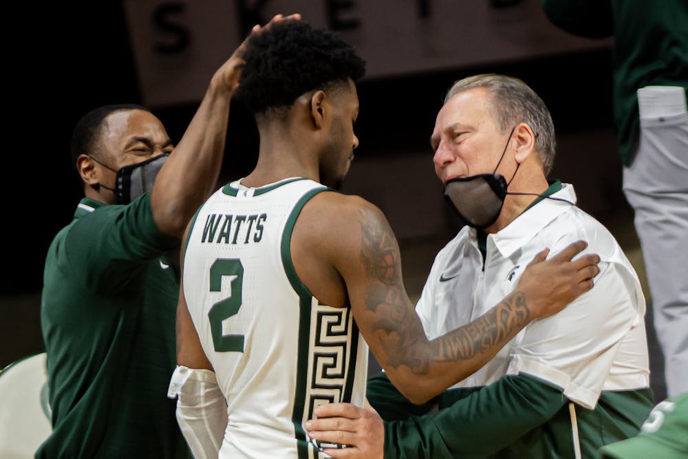 <p>Spartan Head Coach Tom Izzo and sophomore guard Rocket Watts share a moment after upsetting No. 2 Michigan on March 7, 2021. Watts&#x27; 21 points led both teams.</p>