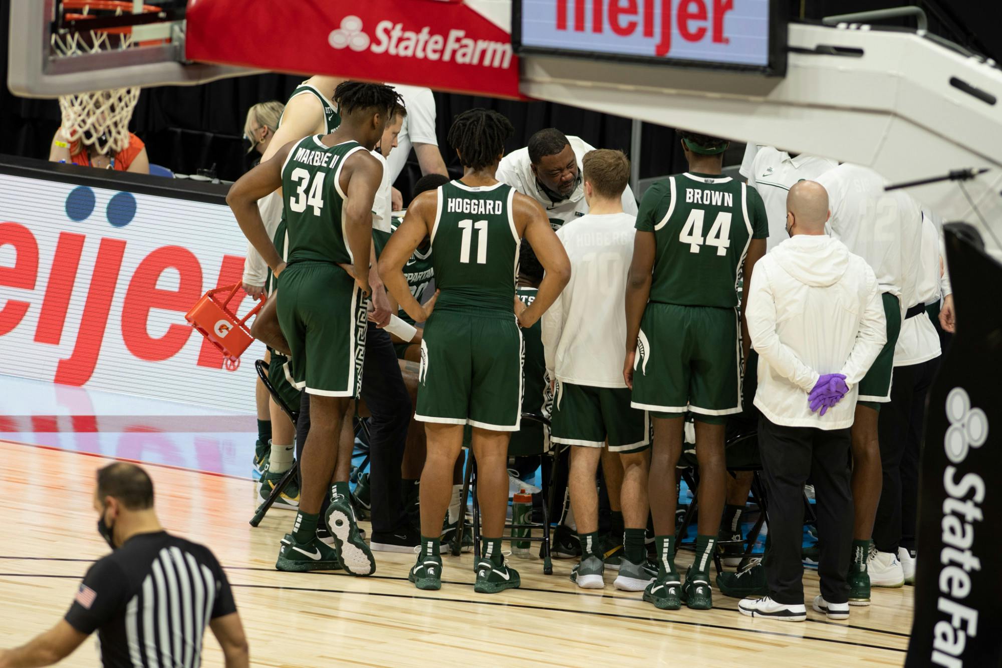 <p>The MSU basketball team gathers during a timeout in the Big Ten basketball tournament during a game against Maryland on March 11, 2020.</p>