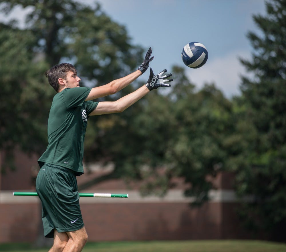 Accounting sophomore Brendan Randall makes a catch during the second Quidditch practice of the year on Sep. 2, 2018 at IM East.