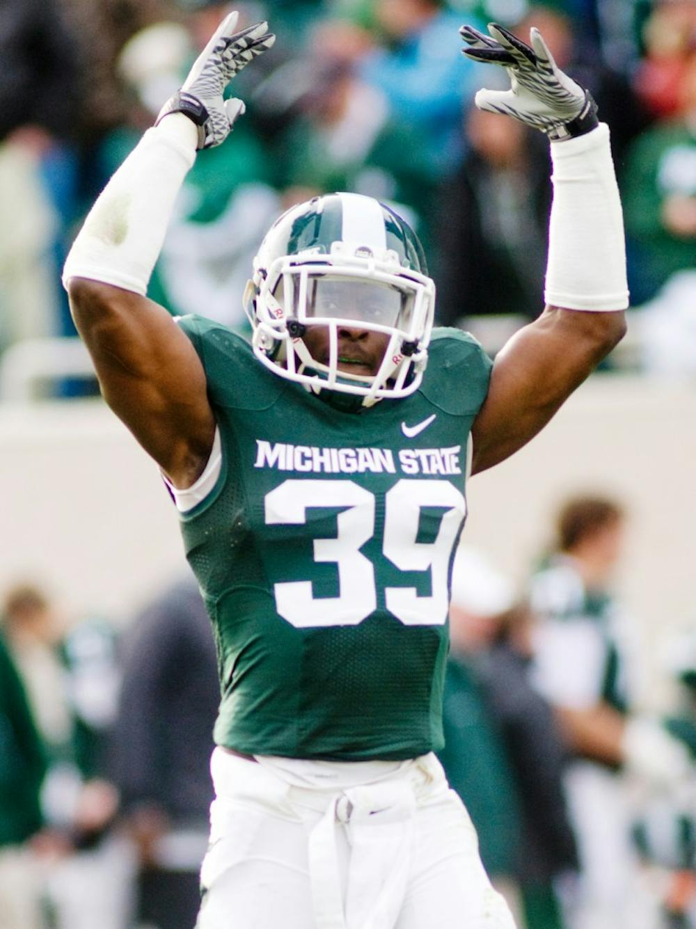 Junior safety Trenton Robinson looks to the crowd for support during the final quarter of the Spartans' last home game of the season last year on November 20, 2010 at Spartan Stadium.  The Spartans rallied during the second half of the game against Purdue to defeat the Boilermakers, 35-31. State News file photo