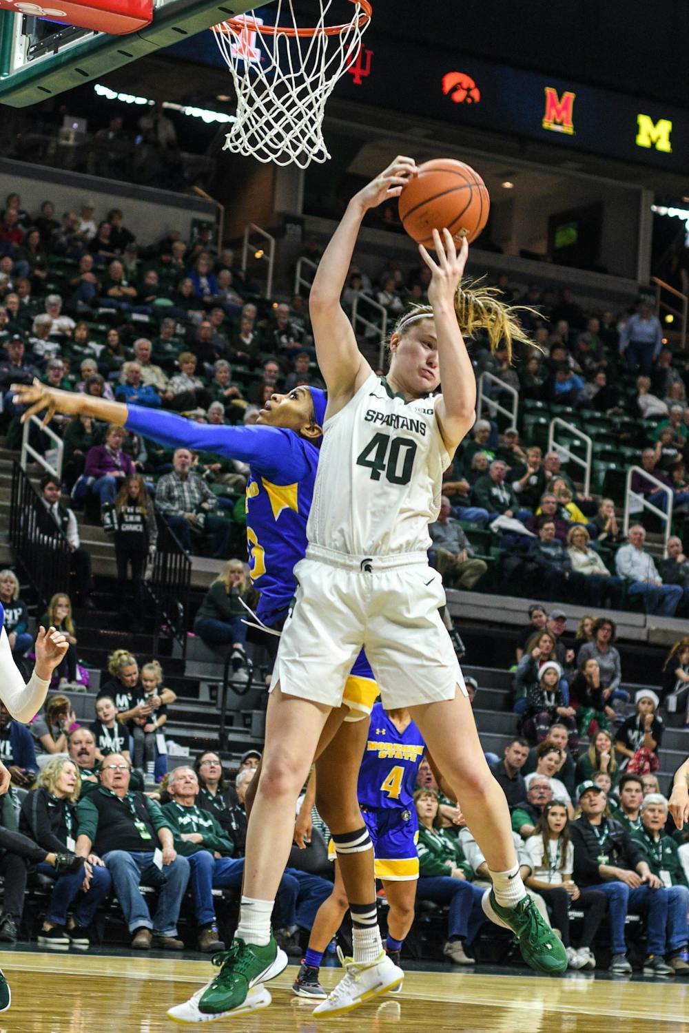 <p>Then-freshman guard Julia Ayrault (40) shoots the ball during the game against Morehead State on Dec. 15, 2019, at Breslin Center. The Spartans defeated the Eagles, 93-48.</p>