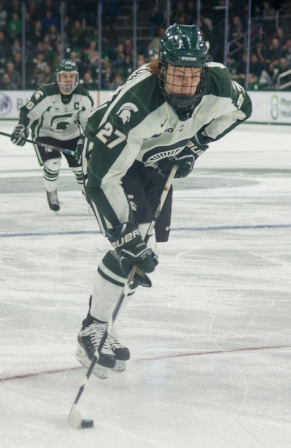 Freshman forward Mason Appleton takes control of the puck during the hockey game against Minnesota on March 4, 2016 at Munn Ice Arena. The Spartans were defeated by the Gophers, 4-2.