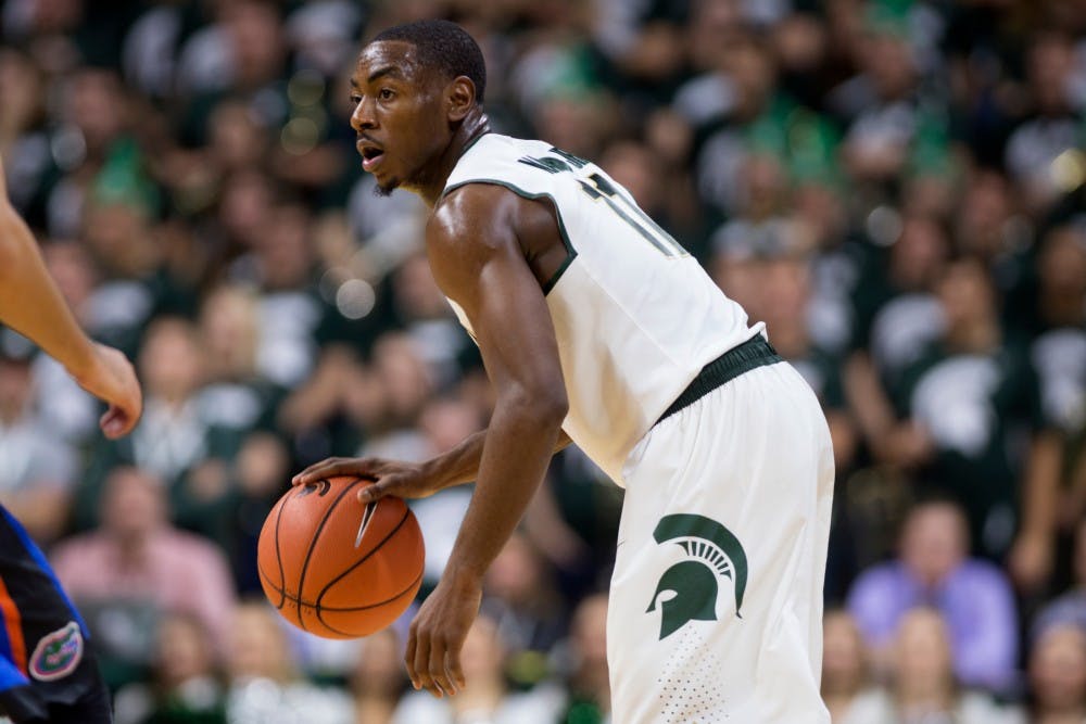 Sophomore guard Lourawls 'Tum Tum' Nairn Jr. dribbles the ball on Dec. 12, 2015 during the game against Florida at Breslin Center. The Spartans defeated the Gators, 58-52.