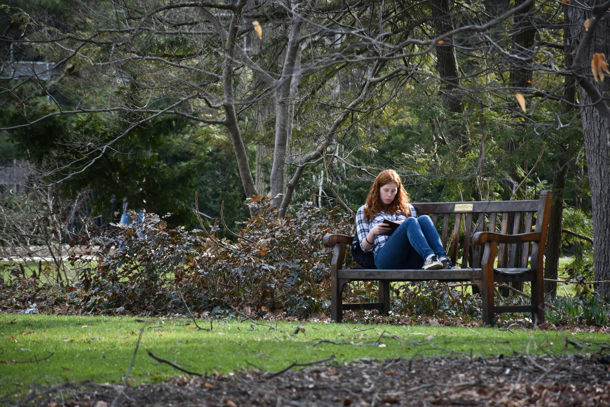 An MSU student enjoys the warm weather on campus on April 5, 2022. 