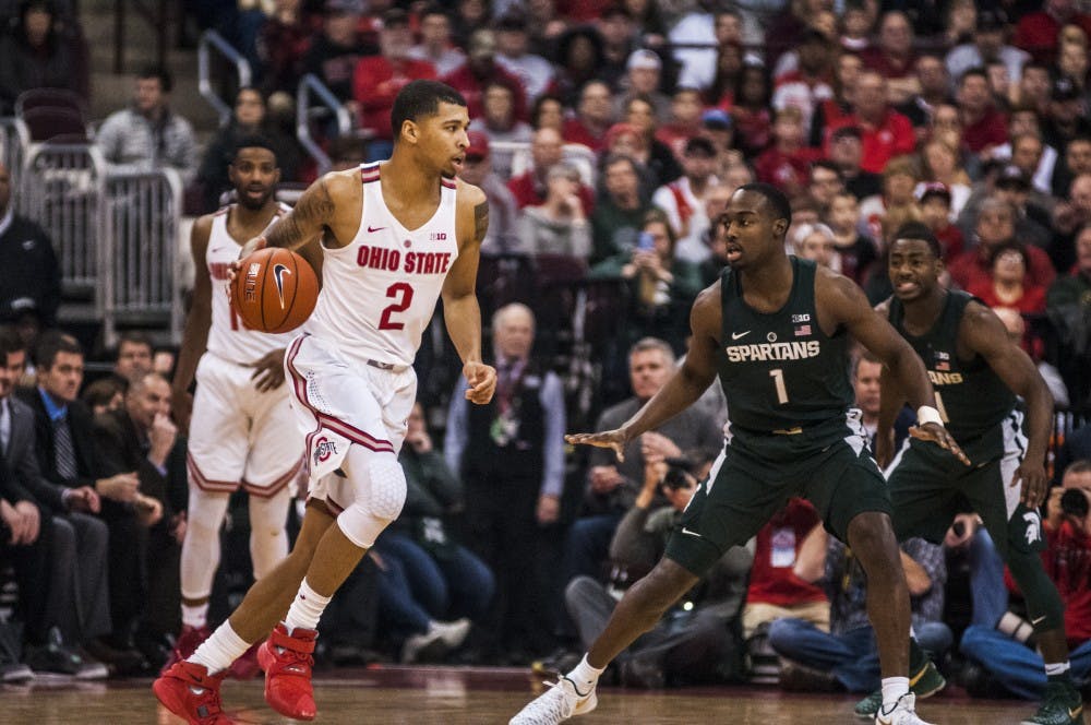 Ohio State forward Marc Loving (2) looks to score while freshman guard Joshua Langford (1) defends him during the game against Ohio State on Jan. 15, 2017 at the Jerome Schottenstein Center. The Spartans were defeated by the Buckeyes, 67-72.