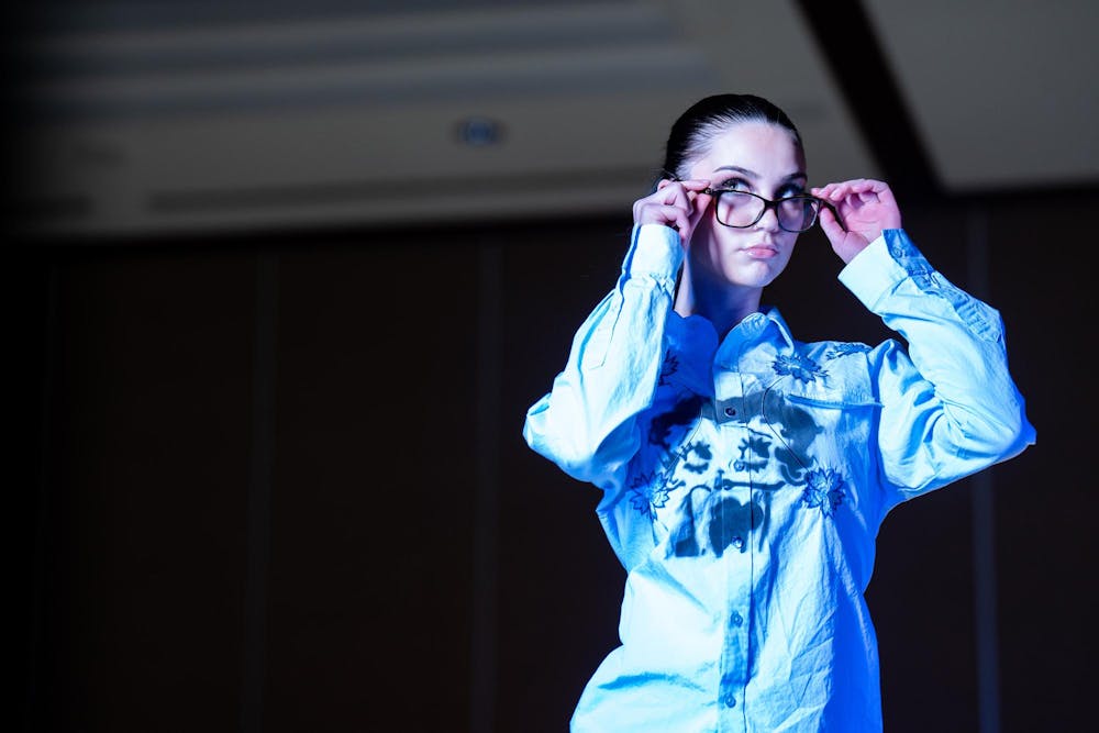 Korinna Lentsch poses during N Crowd magazine’s fall fashion show at The Lansing Center on Dec. 8, 2024. N Crowd, a fashion magazine and non-profit organization for creatives at MSU, holds a fashion show every semester.
