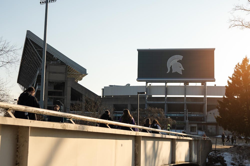 <p>Students walking on the bridge between the Spartan Stadium and Main Library on Feb. 16, 2026, in East Lansing, Michigan.</p>