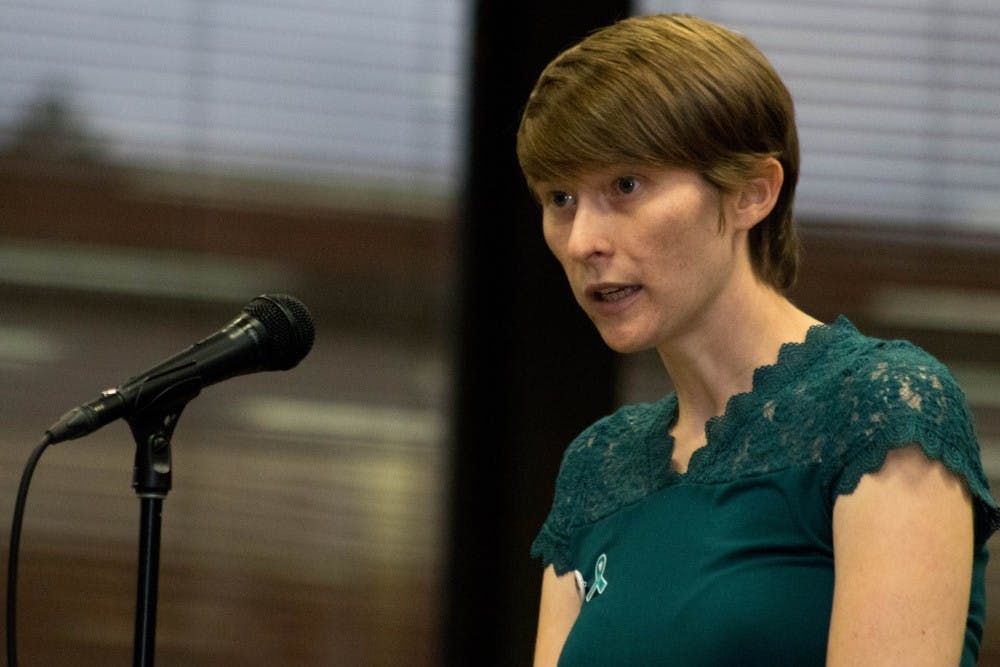 Betsy Riley of Reclaim MSU speaks at the presidential search listening session at the Kellogg Conference Center on Oct. 11, 2018.