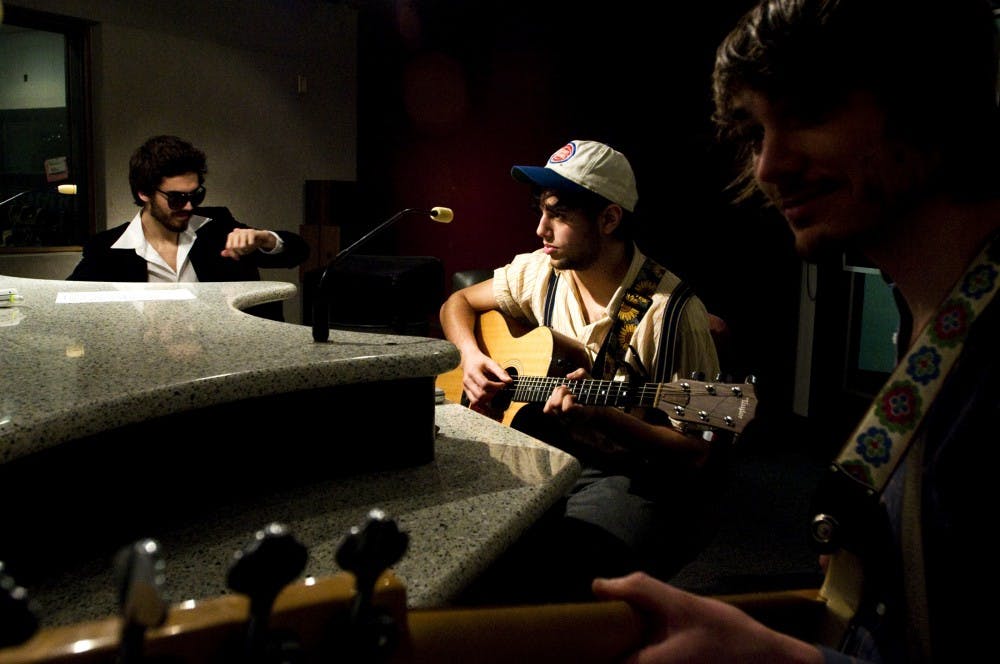 Members of Lansing based band Joe Hertler and the Rainbow seekers perform for listeners of MSU student radio station The Imapct February 11, 2011. Hertler and his band continue to play shows across the Midwest. Matt Hallowell/The State News