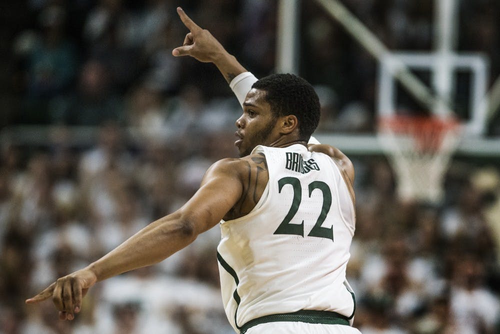 Sophomore forward and guard Miles Bridges (22) celebrates after scoring a basket during the game against Notre Dame on Nov. 30, 2017 at Breslin Center. The Spartans took down the Fighting Irish, 81-63. 