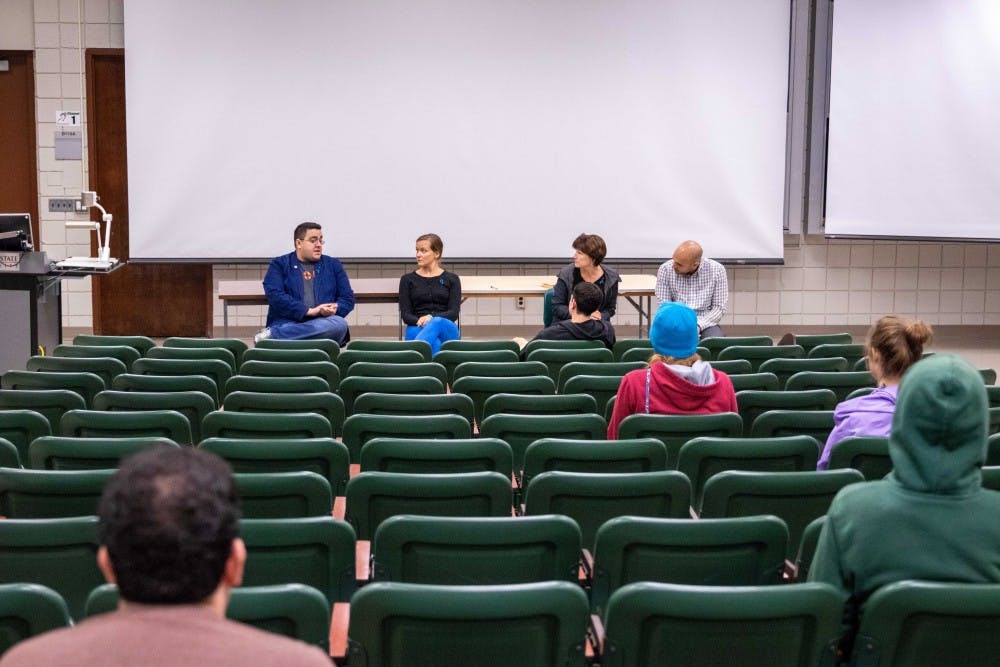 <p>Members of a panel with CAPS speak at Wells Hall on Sept. 10, 2018 after a screening of "The 'S Word'," a documentary.</p>