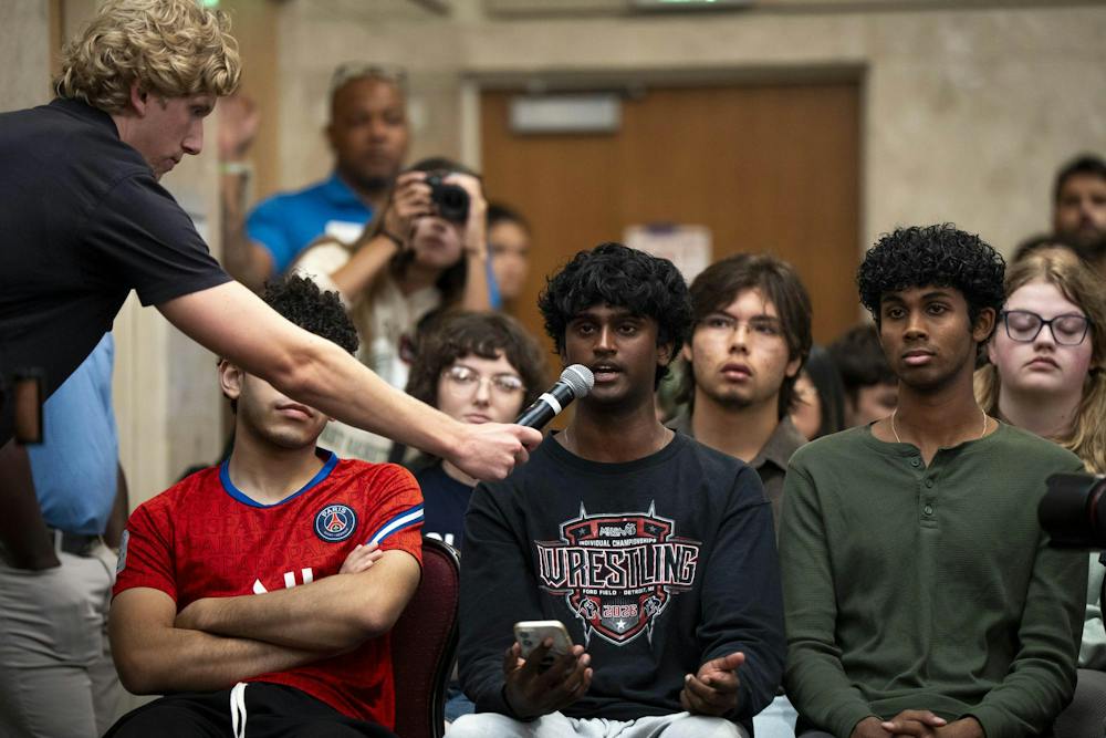 <p>A Michigan State University student asks Abdul El-Sayed a question during a rally at the MSU Union in East Lansing, Mich., on Sept. 11, 2026.</p>